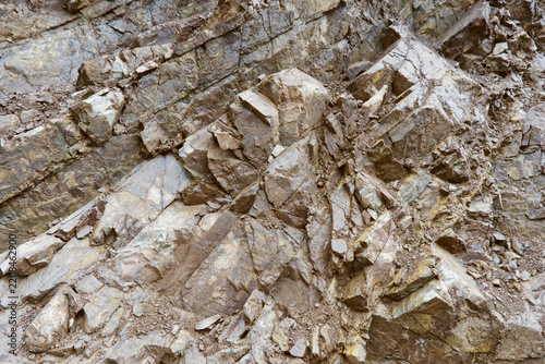 Weathered Cliff Surface Texture with Mineral Deposits