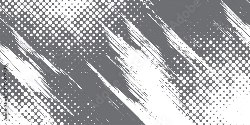 Textured grey paint splatters and brush strokes on a white background abstract grunge pattern.