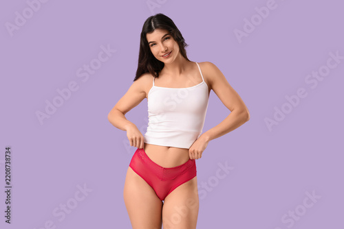 Obraz na plátně Body positivity and self-love, young woman in lingerie smiling with confidence a
