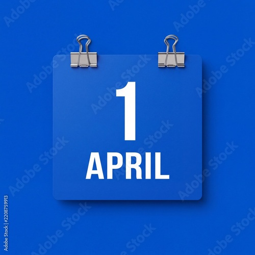 A blue square calendar page showing the date of april 1st hanging on a blue wall background with calendar sheet with sheet