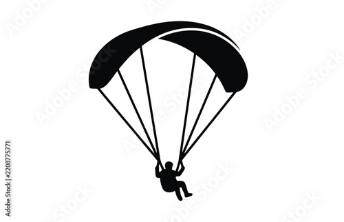 person paragliding in air with parachute