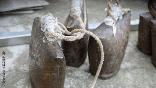 Traditional Livestock Bells with Rope and Worn Metal