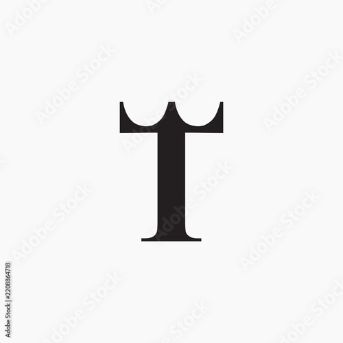 T alphabet letter logo icon in black and white color. Creative design with king crown for luxury or fashion company and business.