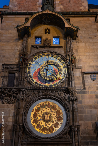 Illuminated medieval astronomical clock in Prague at night