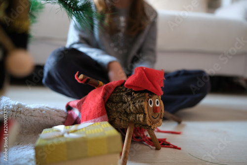 Children celebrating catalan tió de nadal tradition