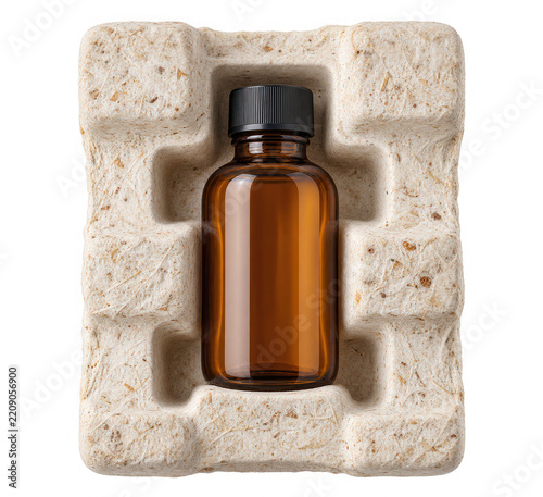 Amber glass bottle in molded pulp packaging insert