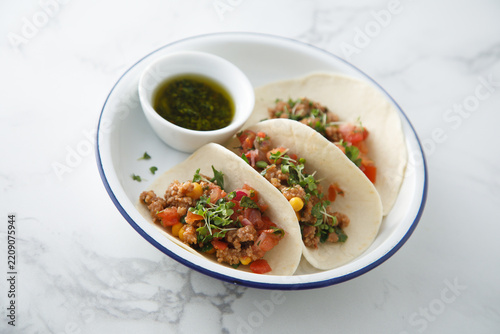 Beef taco with vegetables and corn