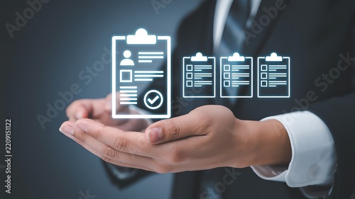 Businessperson's hand presenting checklist icons during a professional audit with digital interface and soft focus background
