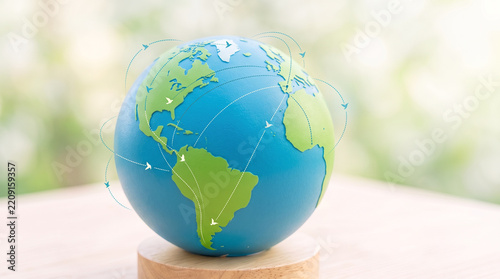 Bird migration map on a globe in soft natural light  