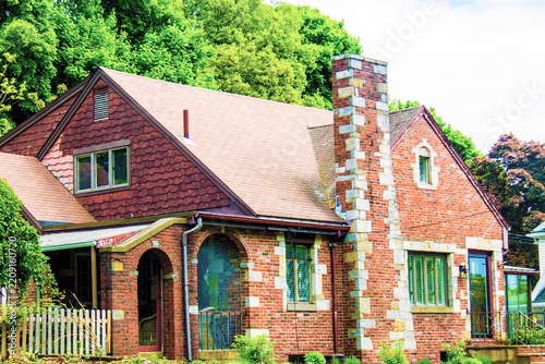 Fotografie MULTICOLOR BRICK CHIMNEY ATA RESIDENTIAL HOUSE