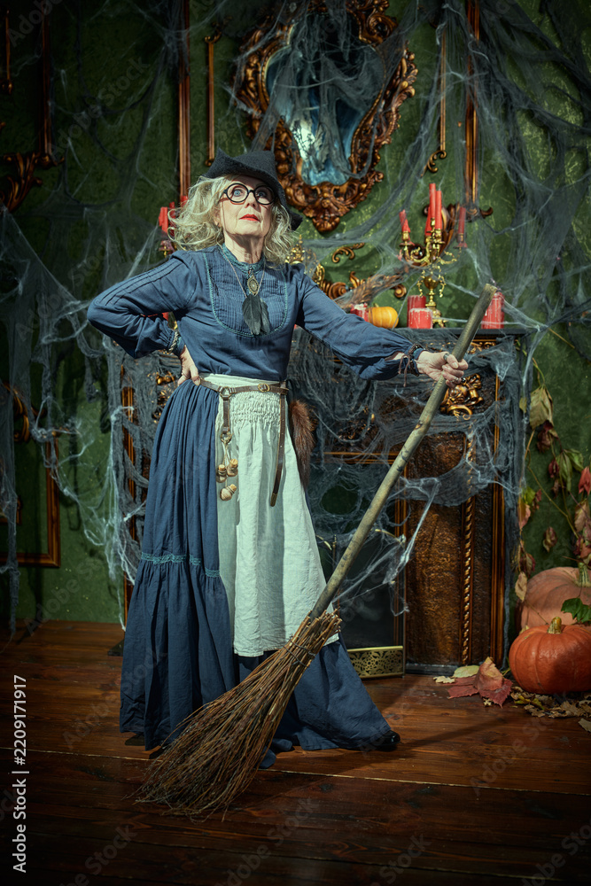 Obraz premium Confident Witch with Broom
