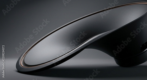Abstract concept of a singular massive speaker cone curve in matte charcoal gray