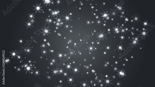 Sparkling white star particles gracefully float across a dark gradient background creating an etherea