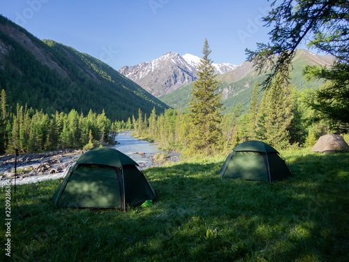 Camping in the Altai Mountains, Karakavak, in summer. Camping above a raging mountain river.
