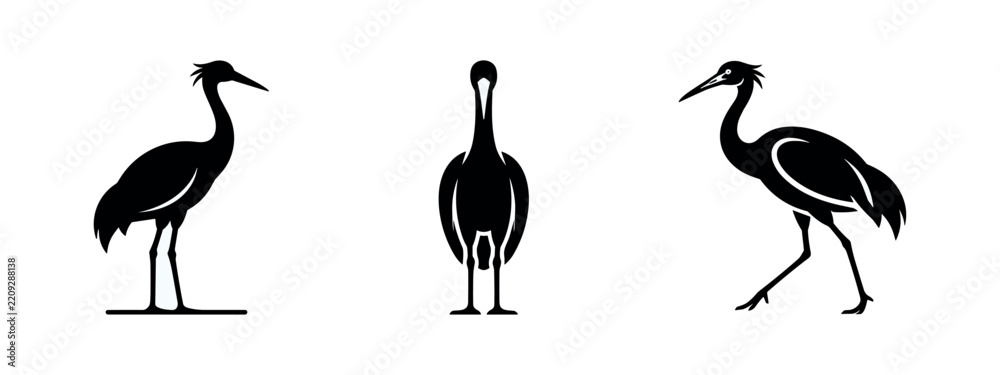 Obraz premium Set of elegant black crane or stork bird silhouettes in various poses on white background, ideal for minimalist designs.