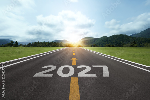 New year resolution 2027 concept. Word start 2027 on road at sunset. for challenge and beginning planning, Business target and growth strategy.