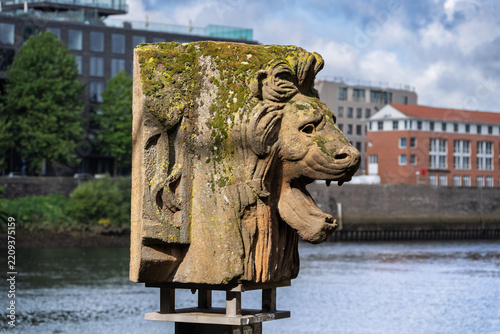 Bremen city lion statue in front of historic architecture with copy space, Bremen, Germany