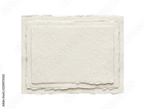 Stacked handmade deckle edge paper cards on transparent background