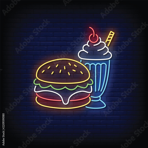 Neon sign hamburger and milkshake with whipped cream and cherry on dark brick wall background for fast food restaurant, diner, and cafe design