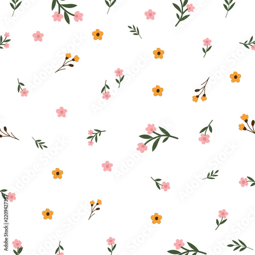 Delicate floral pattern with small wildflowers and leaves on a white background