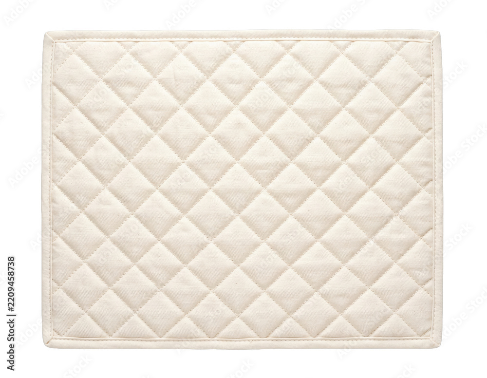Obraz premium Square beige quilted fabric mat with a diamond pattern isolated on a clean white background