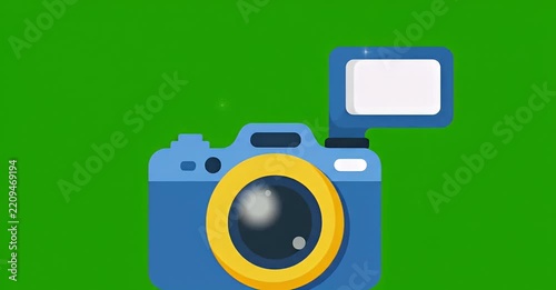 A blue cartoon camera with a yellow lens and a white flash unit on a vibrant green screen background, ready for photography.