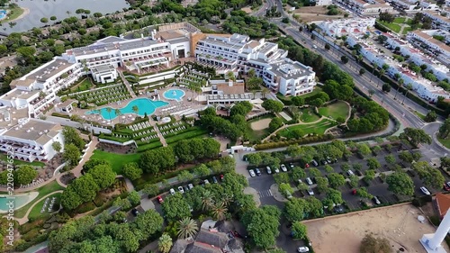 Aerial video of hotels and the lighthouse in El Rompido. Tourist and vacation paradise. 