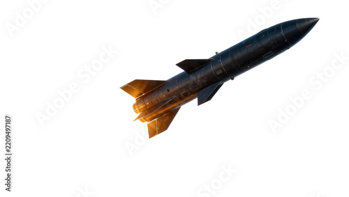 Dark metallic missile with fins and pointed nose, isolated on transparent background