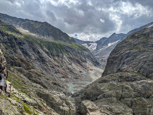 Glacial valley of Tre-La-Tete with rocky cliffs in Les Contamines-Montjoie, France