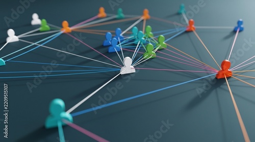 Colored human figure icons connected by lines forming a complex social network on dark surface with community