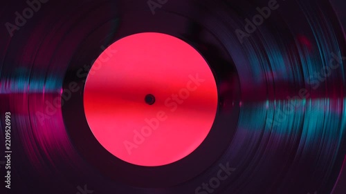 Close-up of a vinyl record spinning on a turntable
