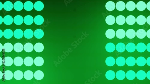 Twin Columns of Illuminated Dots Framing an Empty Green Center Stage