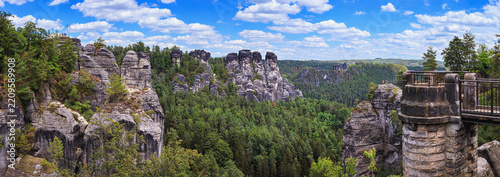 Beautiful landscape, panorama, banner - view of the Bastei rock formations next to the Bastei Bridge in the Elbe Sandstone Mountains, in Saxony, Germany