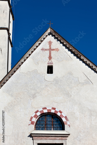 Medieval mountain church architecture historic religious heritage and alpine culture with ancient fresco and stone facade details