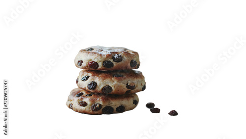 Stack of three freshly baked raisin cookies isolated on transparent background