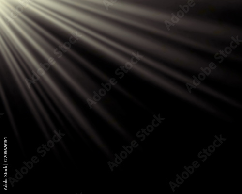 Soft white light rays radiating from corner against black background with light beam light effect lens flare