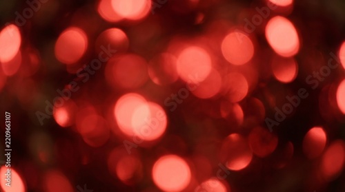 Red Abstract Background with Soft Bokeh Lights and Glowing Circles