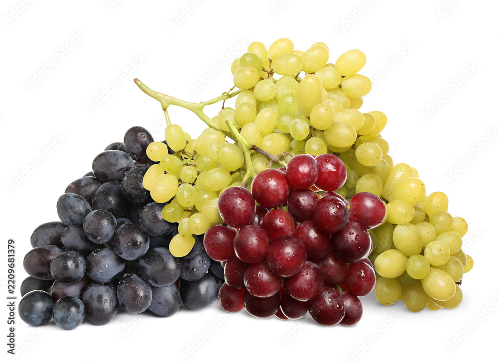 Obraz premium Bunches of red, green and black grapes isolated on white