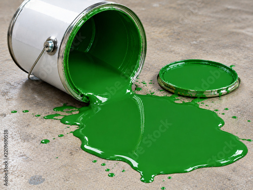 A spilled can of green paint