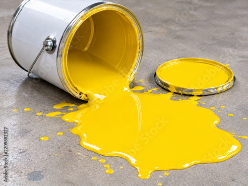 A spilled bucket of yellow paint