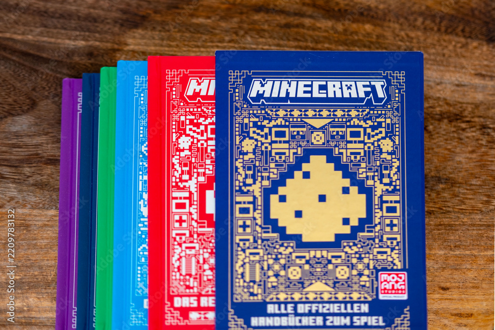 Naklejka premium Minecraft books covers pixel art design, Mojang official merchandise guide books, Collector items for Minecraft fans, Pop culture, gaming literature collector items blocky aesthetic, gaming franchise