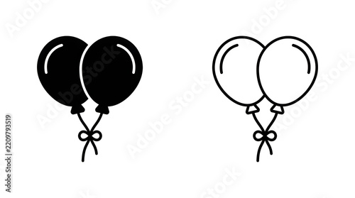 Two black balloons tied with a string