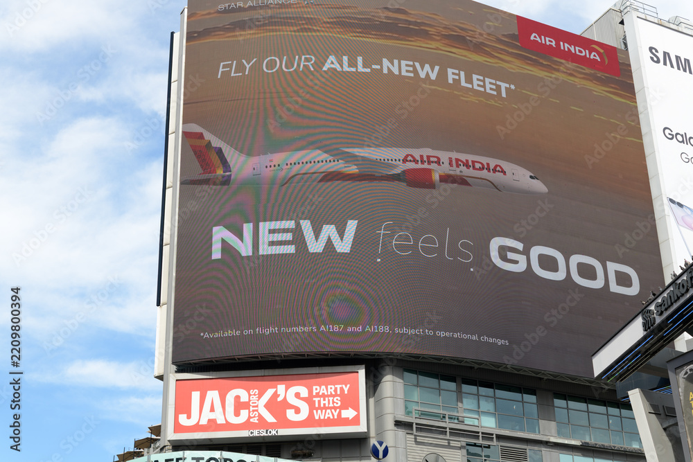 Obraz premium large-format electronic billboard featuring ad for Air India outside The Tenor a shopping mall facing Sankofa Square, Toronto