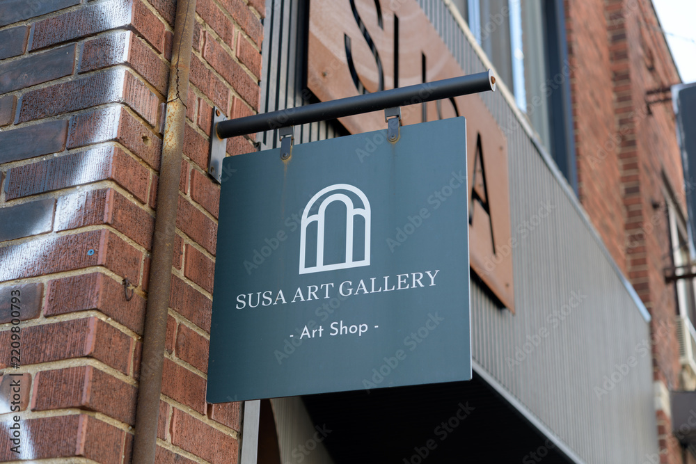 Obraz premium wall mounted projecting sign outside Susa Art Gallery located at 711 Mount Pleasant Rd, Toronto