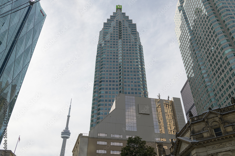 Obraz premium an upward view of TD Place (161 Bay St) with nearby buildings, Toronto