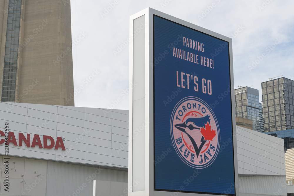 Obraz premium parking sign with Toronto Blue Jays logo off Bremner Blvd, Toronto