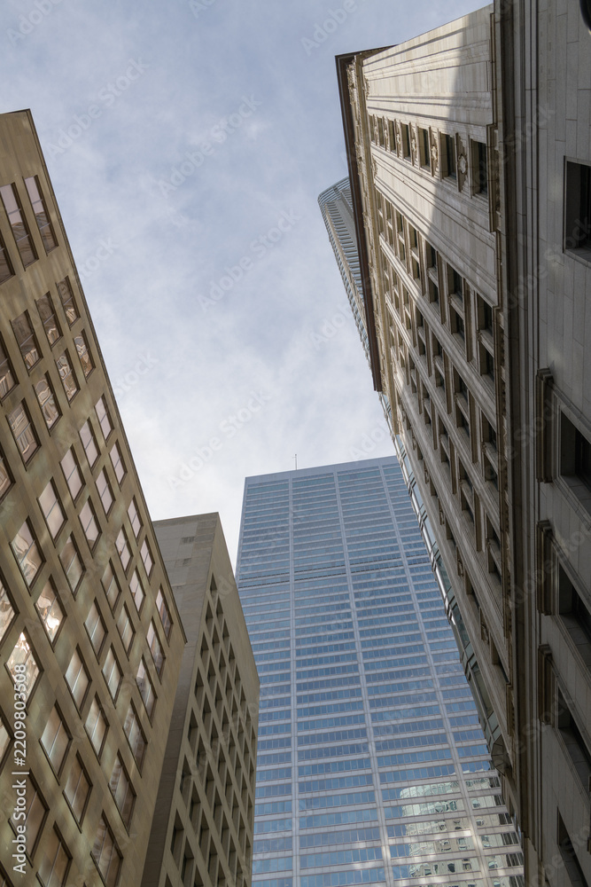 Fototapeta premium skyward view on Melinda St off Yonge St to east elevation of Commerce Court West, One King West Hotel & Residence, and 69 Melinda St, Toronto