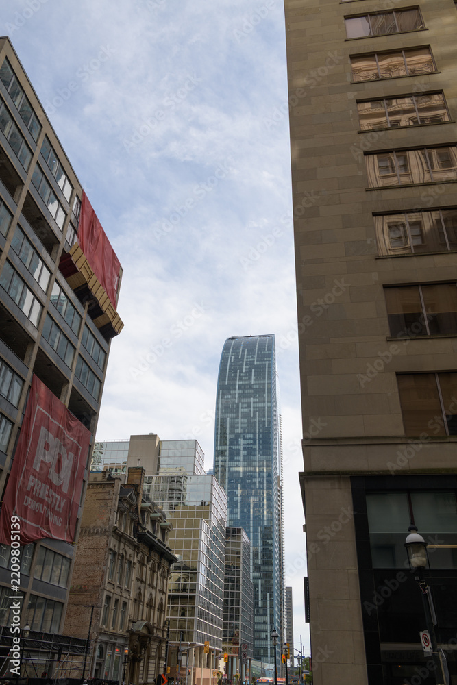 Fototapeta premium looking south on Yonge St to The L Tower a condo at 8 The Esplanade, Toronto