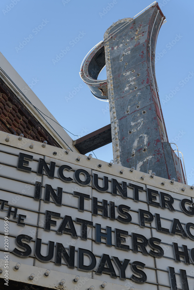 Fototapeta premium exterior marquee structure sign at the former Mount Pleasant Theatre (renamed 1951) originally Hudson Theatre (1926) at 675 Mount Pleasant Rd, Toronto