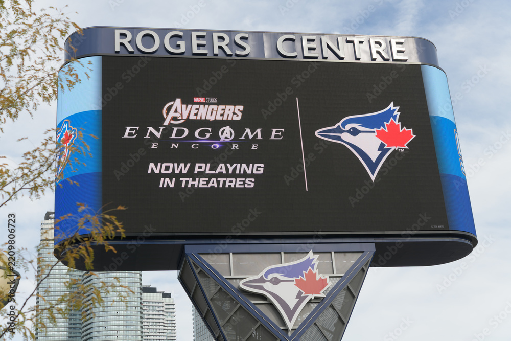 Fototapeta premium Rogers Centre Gardiner Pylon LED sign featuring advertising for Avengers Endgame, Toronto